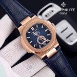 TheChronoLux - Patek Philippe Nautilus Annual Calendar 42mm Gold & White, 13327427050444078